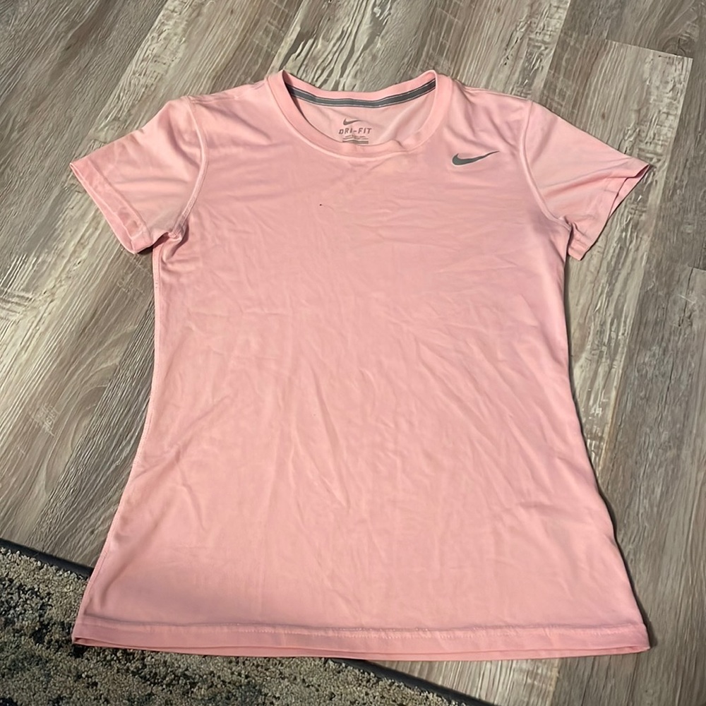 light pink Nike shirt has one small paint mark on it otherwise brand new cond.